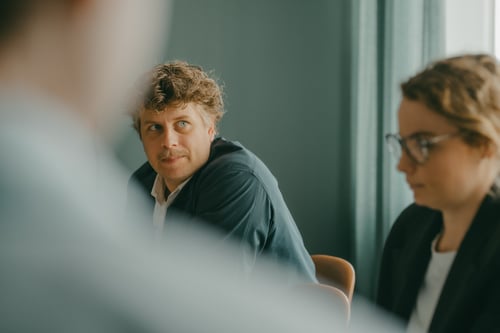 Two people in a meeting